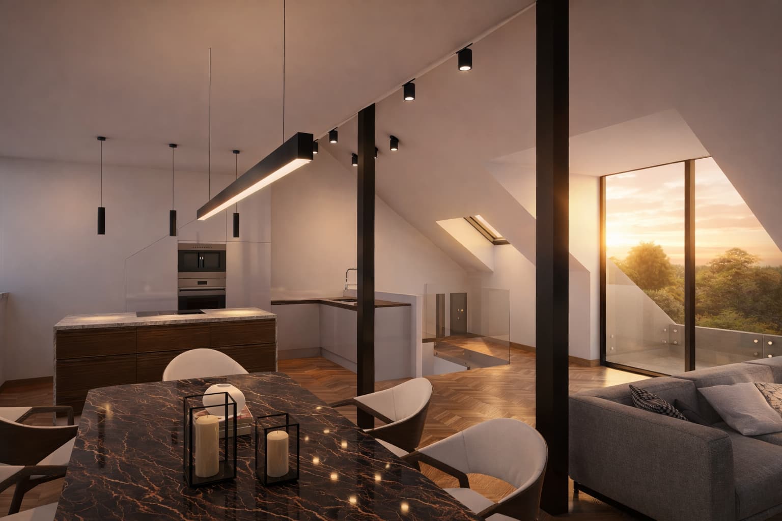 An upper-floor interior at dusk — open-plan kitchen and living under a pitched roof, pendant lights over a marble island, the valley through the glazing.